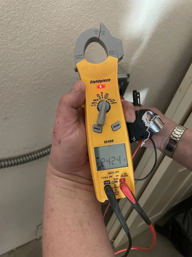 Voltage testing with clamp meter during Generator Installation in Fairfax